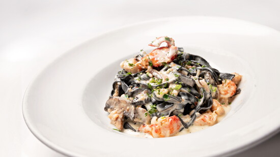 Biaggi’s Lobster Fettuccine gets its eye-catching color from squid ink and has become a guest favorite.