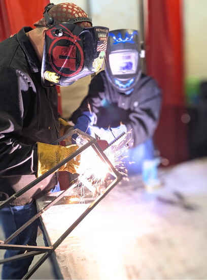 Sparks fly as students develop practical welding skills in one of Youth Impact's many enrichment programs designed to prepare youth for future success.