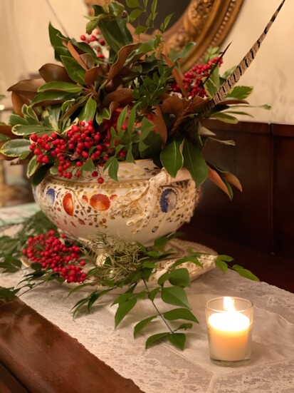 Nandina, Magnolia and feathers are naturally festive in a tureen. 