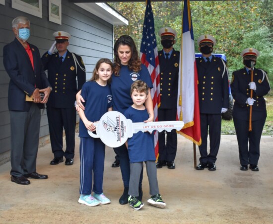 Home program recipients Houston Fire Department Arson Investigator Lemuel Bruce's family