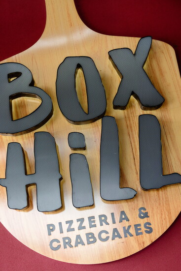 A sign at Box Hill Pizzeria & Crab cakes. Photo Credit: Kerry Paradis Photography