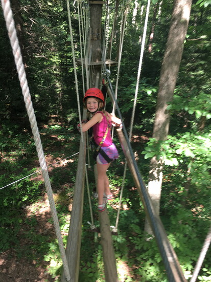 Jane Condran smiling while taking a moment on the Timber Trek