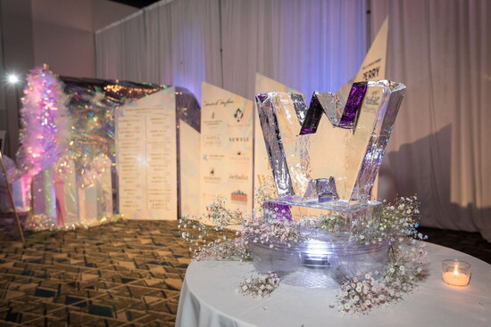 Stunning table decor and sponsor wall, The Walk, 2024.