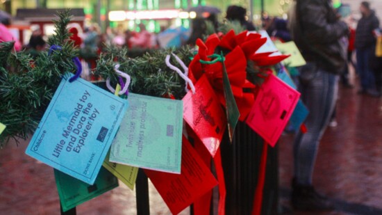 Pick up a gift tag at the giving tree at the Grove Plaza in downtown Boise