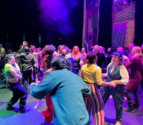 Community dance party on the Merrill Auditorium stage at the conclusion of CONTRA-TIEMPO. Photo courtesy of Portland Ovations.