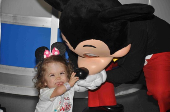 Mayah with Mickey Mouse. 