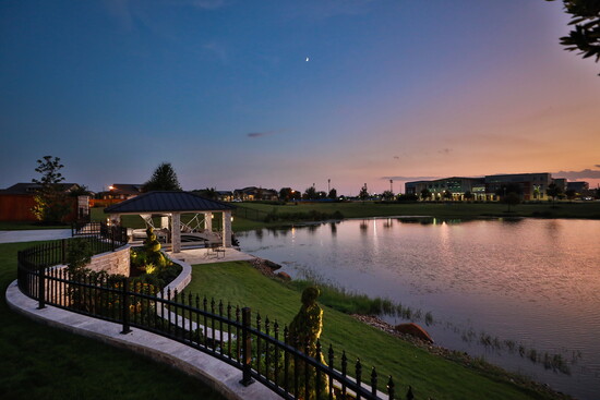 Expansive patios, a sparkling pool, and a private dock all highlight the luxury lakeside lifestyle.