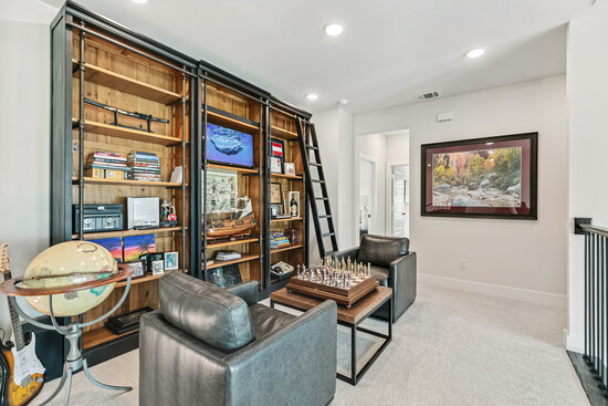 Whether used for reading, playing chess, or simply relaxing, the upstairs loft is a cozy space with endless possibilities.