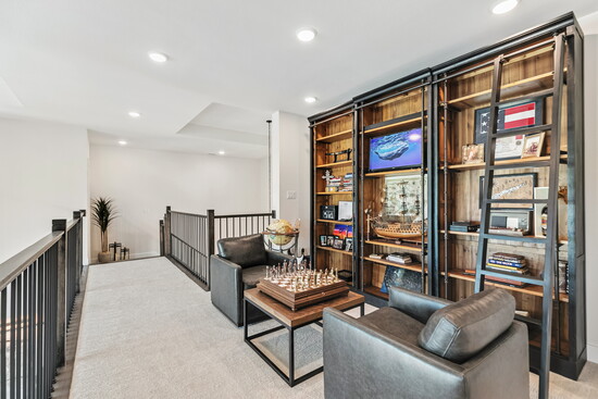 Whether used for reading, playing chess, or simply relaxing, the upstairs loft is a cozy space with endless possibilities.