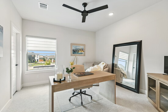A fourth bedroom easily converts into a private office or study, with a large window overlooking the neighborhood.