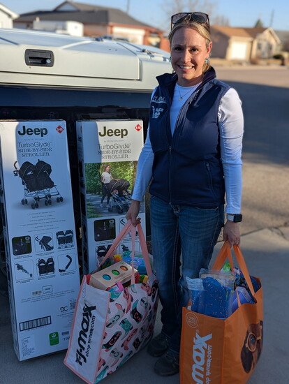 Rebecca Hendricks with Christmas with a Cause Weld County donates strollers and Easter toys for Stork Support’s 2025 Spring Stroller Distribution Event