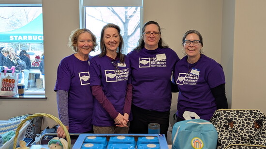 Marge Catt, Liesl Laduke, Leigh Flowers and Nikola Reinfelds distribute infant supplies at the 2025 Project Homeless Connect Larimer County Event
