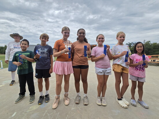 Campers receiving their ribbons.