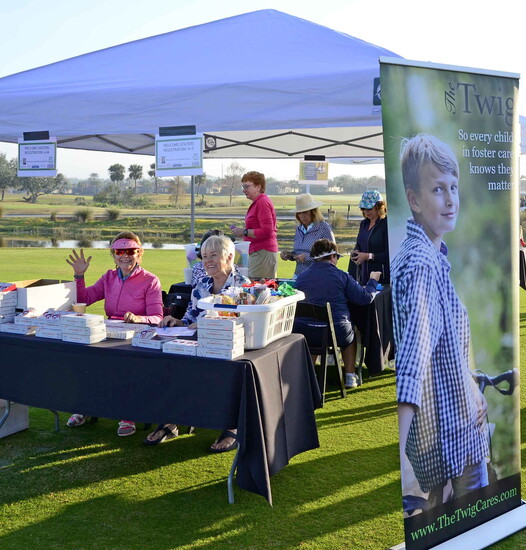 Excitement fills the air as participants check in for The Venetian Golf Club’s women’s fundraiser for The Twig. 