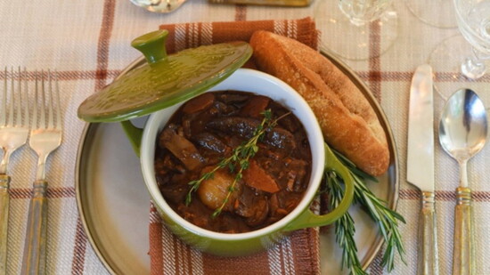 A savory beef bourguignon with potatoes dauphinoise