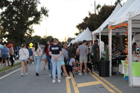 Family, friends and neighbors walk the streets of Chamblee at 'A Taste of Chamblee.'