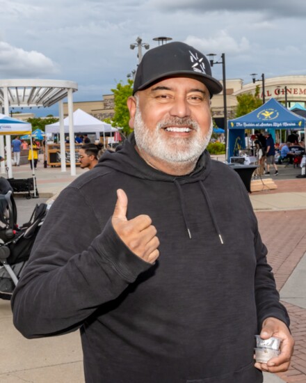 Martin Tudon celebrates his Meat Sweats BBQ after winning the 2024 Taste of Hendersonville.