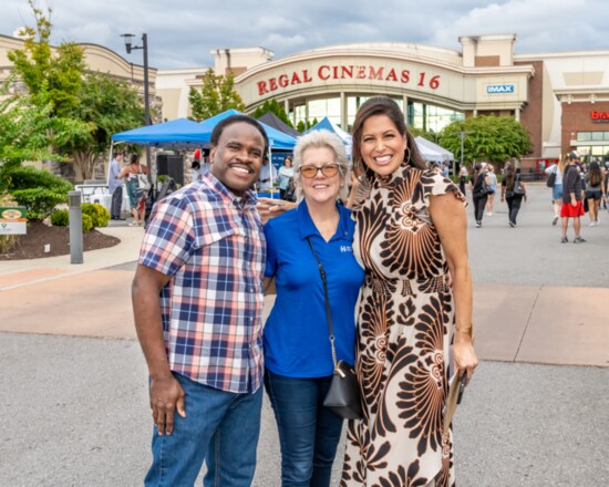 Taste of Hendersonville Lelan Statom and Holly Thompson share a moment with Hendersonville Chamber Board Chair Fran Marcou.