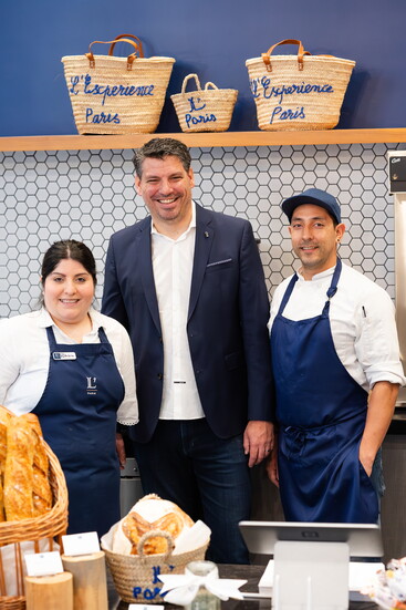 Hervet poses with his staff