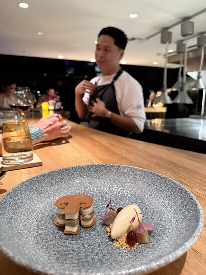 Chatting with the sous chef over dessert at Infini
