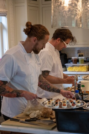 Chef Jason and Chef Kevin collaborate at a local in-home private event. Photo credit: Jacob Steelquist 