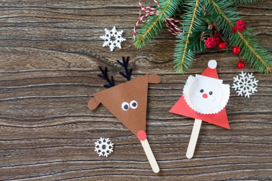 Join in on holiday crafts at Santa's House.