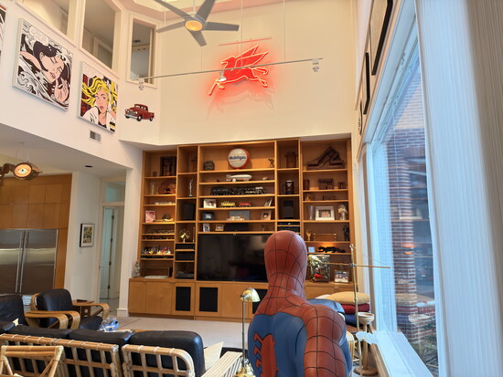 The pegasus of Mobil Oil and the Pop Art of Roy Lichtenstein overlook Spider-Man and the family living room.