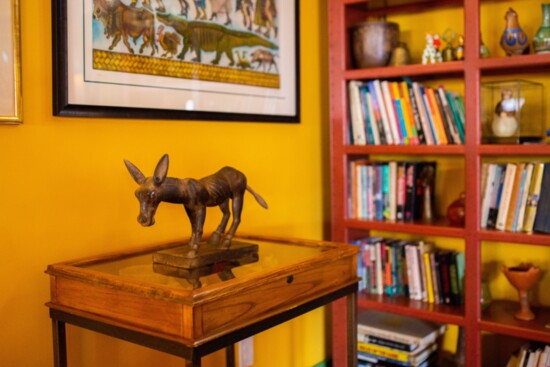 Hand carved burro from Guerrero is perched in the living room.