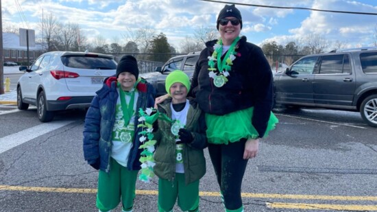 Rebekah Lloyd with her two sons at the 2022 Shamrock Shuffle, a fundraising event for East Elementary School 