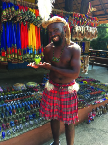 Native South African at a market in Lesidi Cultural Village