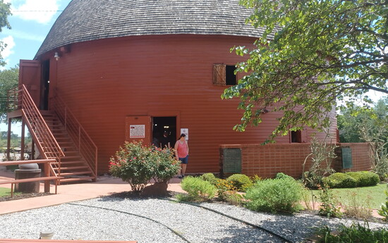 The Round Barn in Arcadia was built by local farmer William Harrison Odor in 1898 using native bur oak boards soaked while green and forced into curves. 