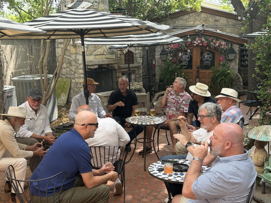 Fredman group gathers at 78624 The Bar for conversation and a cigar - Photo by Amy Tucker