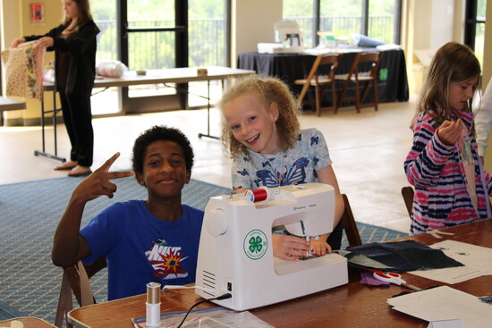 Eli Johnson and Charlotte Clark Albemarle/Charlottesville 4-H Sewing Camp 2024. Photo Credit: Sabrina Wheartly.