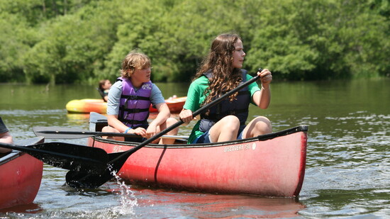 4-H members Marshall Brown(age 10) and Mary Heetderks (age 12). 4-H Camp 2024. Photo Credit: Allyson Henschel. 