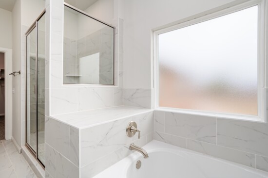 Clean lines and lots of light give this bathroom an upscale, spa-like look. Richard Smith Photography