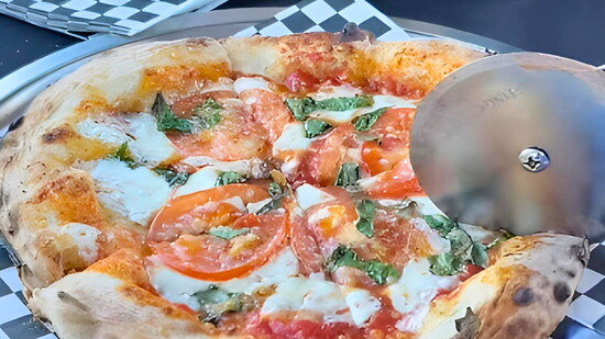 A 10-inch Classic Margherita pizza, fresh from the oven. Photo Credit: Lorelai Land