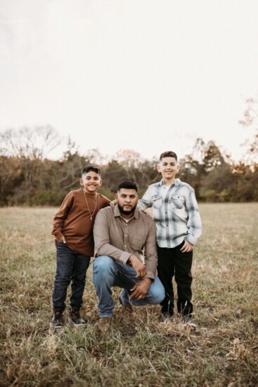 Aaron Villanueva and his two sons