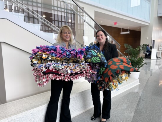 Lisa Pensa donating the No-Sew blankets to Valley Hospital