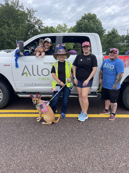 The ALLO team hit the Papillion Days Parade with family by spreading smiles, waving to neighbors, and celebrating the community. 