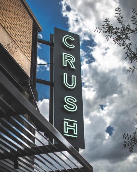 Crush Wine-Bar-Grill offers an upstairs patio with fire pits and a panoramic view of downtown, a full cocktail bar and an excellent menu.