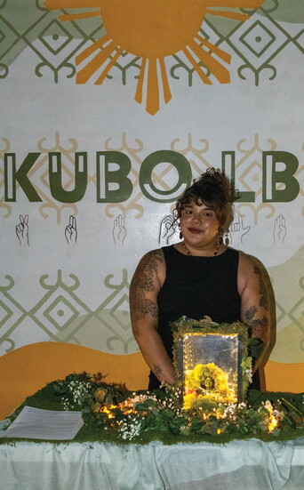 Amor Roldan stands behind her latest piece at Kubo LB.