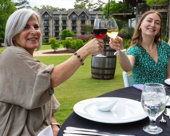 Cheers to a curated dinner on the lawn.