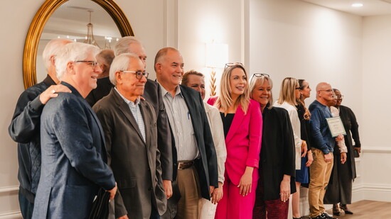 Group posing together following the awards luncheon