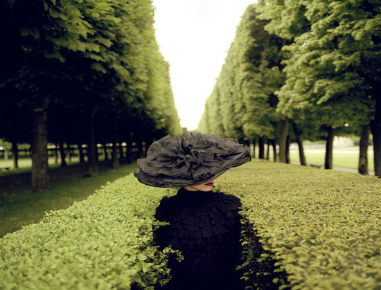 Woman with Hat Between Hedges, Parc de Sceaux, France by Rodney Smith archival pigment print 40” x 40”  limited edition photograph 58” x 58” Gilman Contemporary