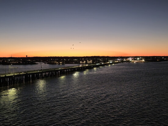 Sunset over the bay as seen from the Cambria Hotel. Photo Credit: Trevor Joppich