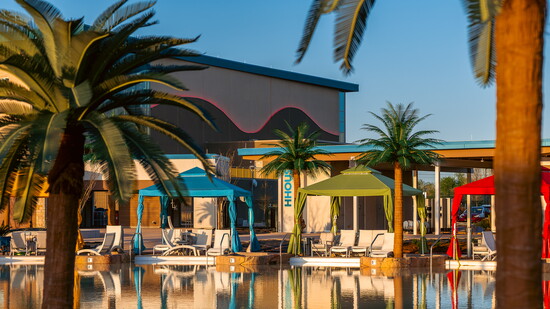 Lounge in private cabanas or play in the sand at Okana’s tropical-inspired beach.