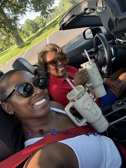 Marvel & daughter, Epiphany Davis, in the 2025 Indian Hill 4th of July Parade.