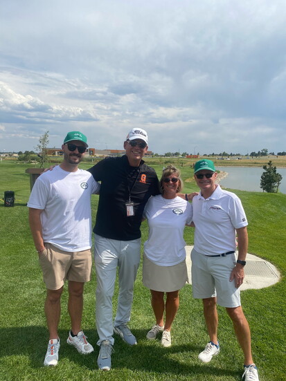 Amy, John, & Joe Lee with Kevin Rohnke, Mike & Joe’s high school golf coach