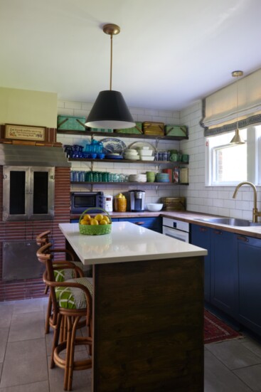 The kitchen is complete with an original wood burning cooking oven