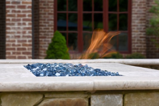 A gas fire element was included into the pool design to add a comfortable seating area near the spa.